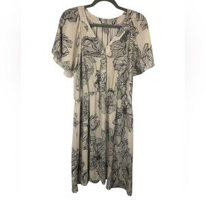 H&M cream and black floral dress. Simple and loose with gorgeous sleeves. Size L